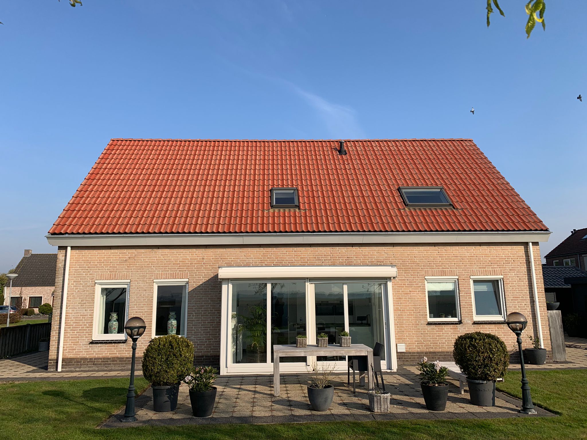 09ce7870-839c-4dfd-9b69-9bcaa7e2912c Dakpannen reinigen